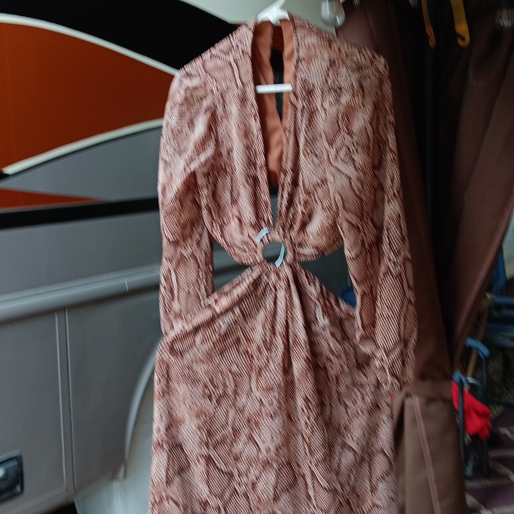 This attractive summer dress is one you wear out in a summer evening to show off